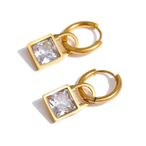 Trendy gold earring with white stone pendant