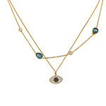 Gold double layer necklace with zirkonia stones and pendant
