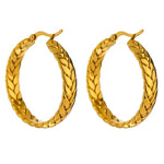 Gold hoop earrings with braided design