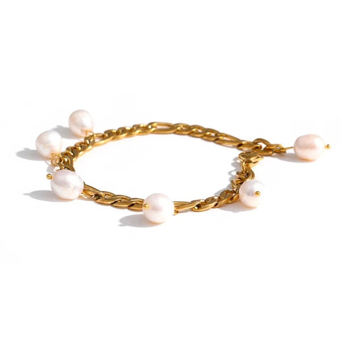 Elegant gold bracelet with pearls